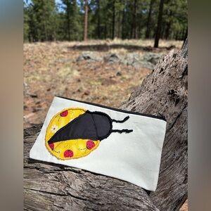-Hand crafted Lady bug Embroidered pouch